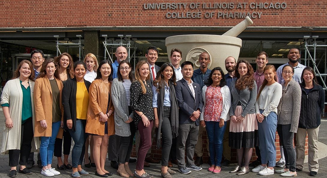 Graduate Students in front of the College of Pharmacy